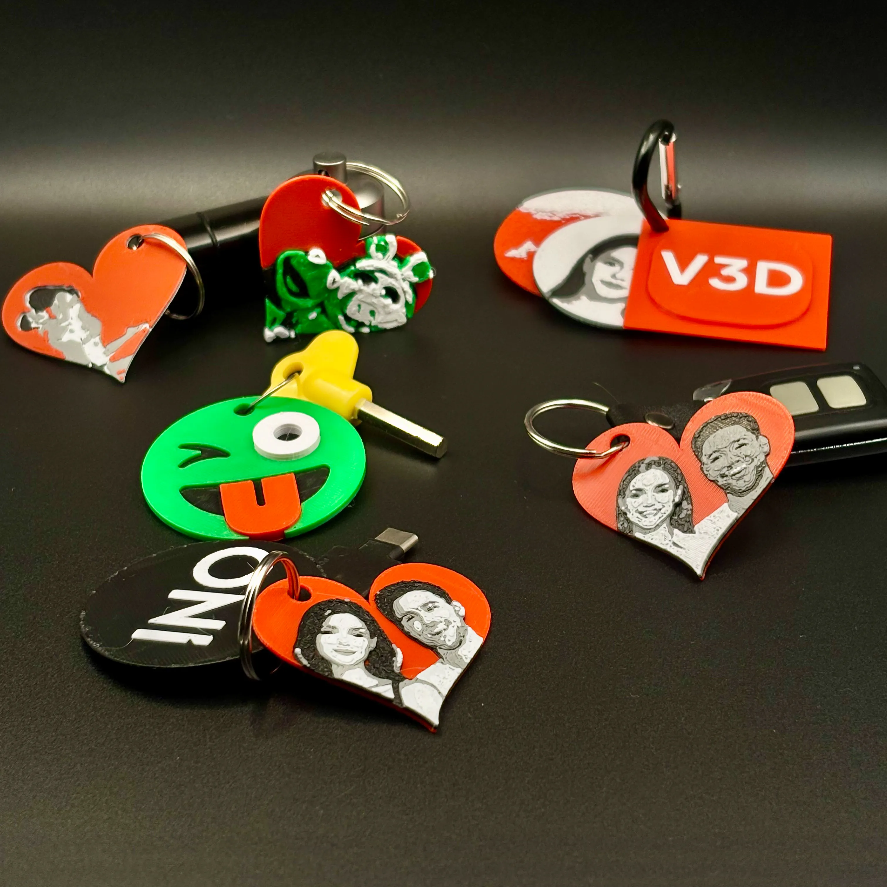 Collection of printed photo keyrings in multiple shapes